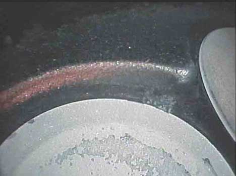Macro image of a seat taken by a VJ-Advance video borescope during an automotive 3.8 litre engine inspection