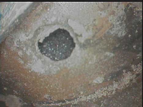 Image showing that corrosion has eaten away at the surface area taken by a VJ-Advance video borescope.
