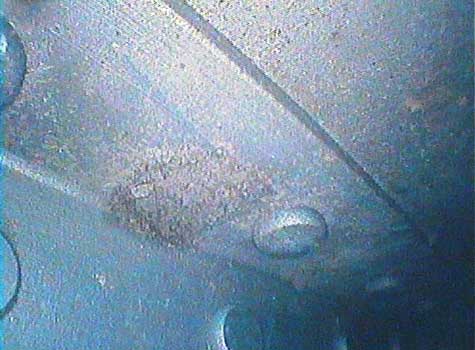 Image of corrosion at fatigue points taken by a VJ-Advance video borescope during an aircraft airframe inspection.