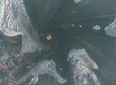 Image of chunking in the stator taken by the VJ-Advance video borescope during an inspection.
