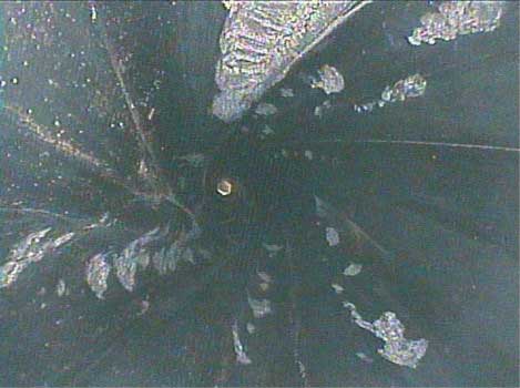 Image of a mud motor with the rotor removed taken by the VJ-Advance video borescope during an inspection.