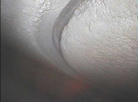 Image of exhaust valve deposits taken by a VJ-Advance video borescope during a Waukeshaw 7042 Inspection