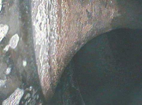 Image of corrosion on an intake valve taken by a VJ-Advance video borescope during a Waukeshaw 7042 Inspection