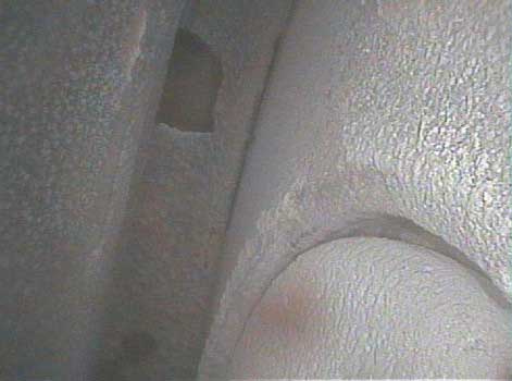 Image of exhaust valve buiildup that is not critical taken by a VJ-Advance video borescope during a Waukeshaw 7042 Inspection