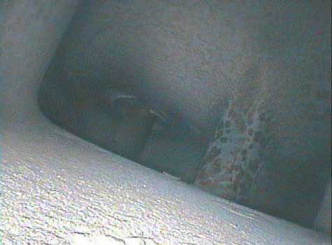 Image of an exhaust manifold taken by a VJ-Advance video borescope during a Waukeshaw 7042 Inspection