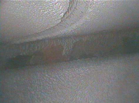 Image of minor deposits taken by a VJ-Advance video borescope during a Waukeshaw 7042 Inspection