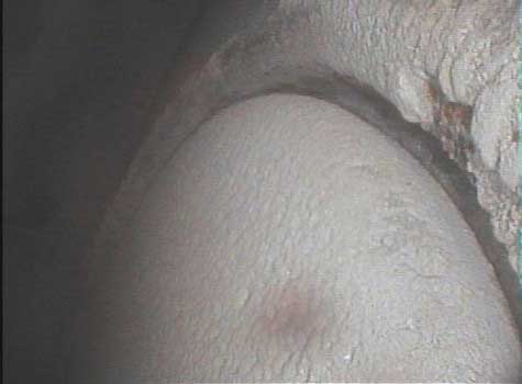 Image of an exhaust valve taken by a VJ-Advance video borescope during a Waukeshaw 7042 Inspection