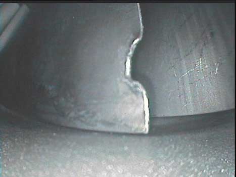 Pratt and Whitney PT6 blade damage as shown through a VJ-Advance video borescope class=