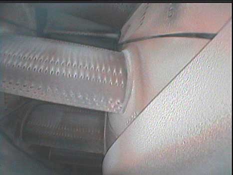 Pratt and Whitney JT9 nozzle guide vanes section as shown through a VJ-Advance video borescope class=