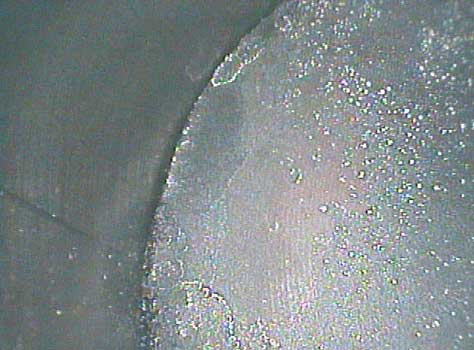 Chrysler engine piston dome photo taken by the VJ-Advance video borescope during an inspection