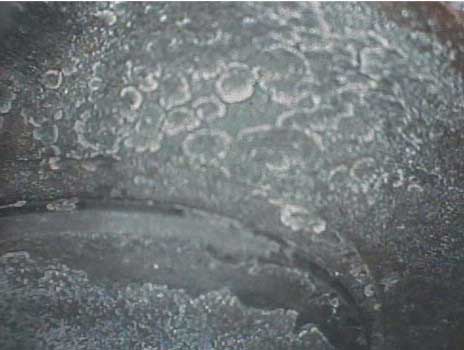Image of deposits on the cylinder headtaken with a VJ-Advance video borescope during a small engine inspection