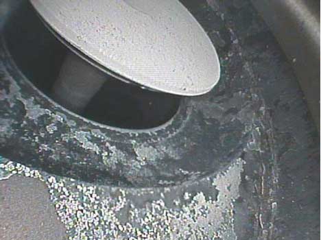 Image of an open intake valve showing corrosion on the valve seat taken with a VJ-Advance video borescope during a small engine inspection