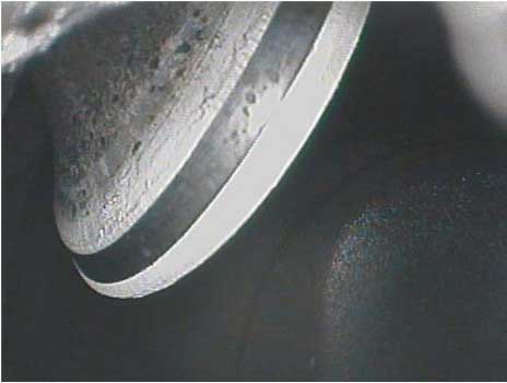 Image of an intake valve seat that is in decent condition taken with a VJ-Advance video borescope during a small engine inspection